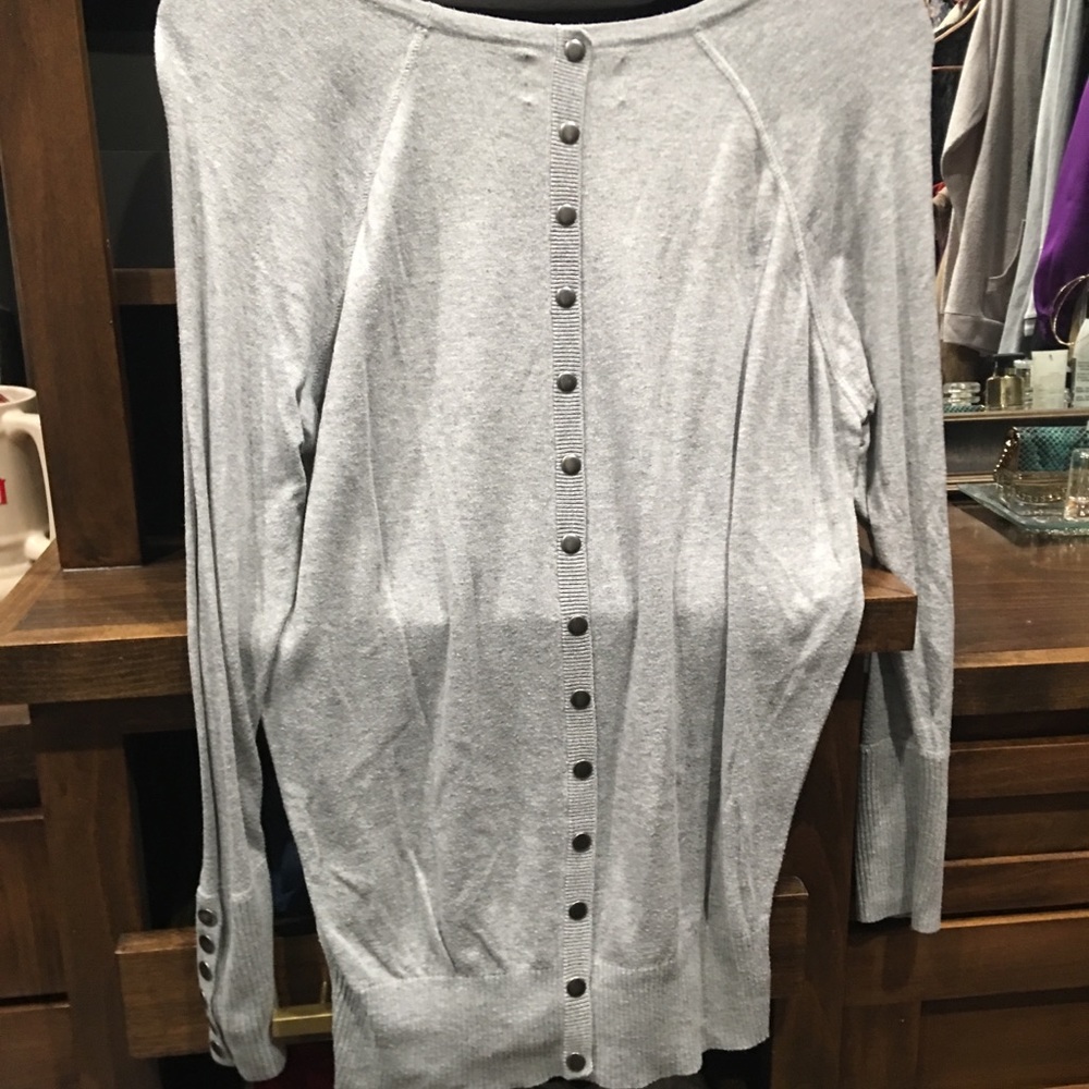 Tunic sweater with button detail down back